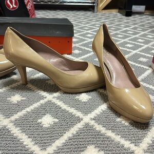 2 pairs of nude Vince Camuto heals. One pair sz 8. Other sz 9